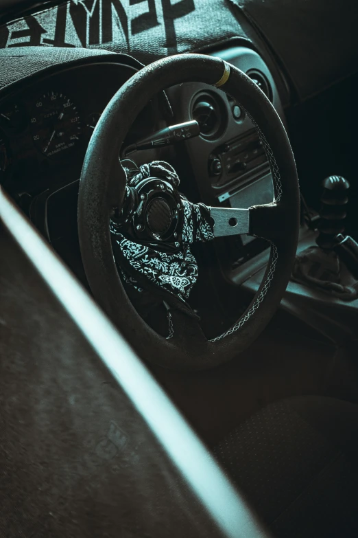 closeup view of steering wheel and center console of a race car