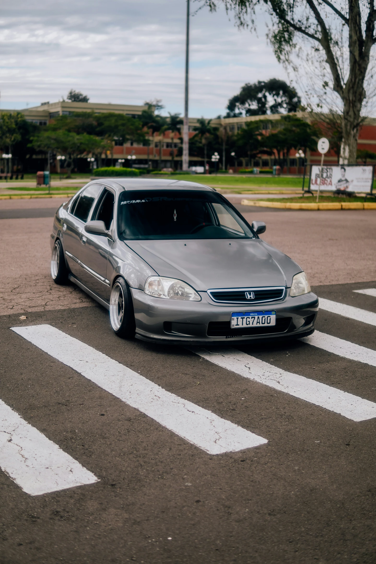 a car is sitting in a parking lot