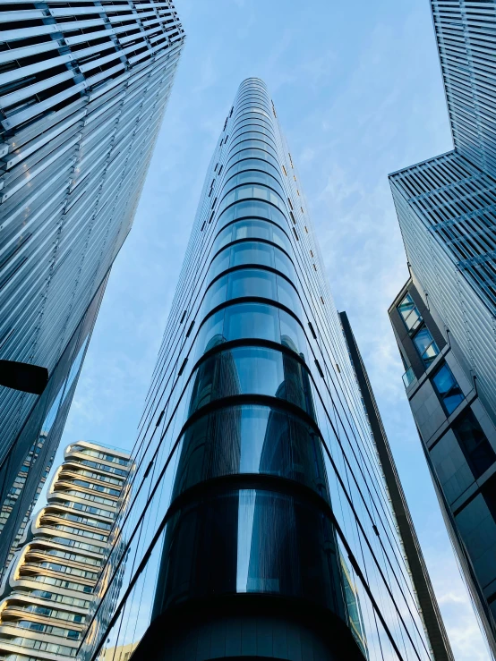 an abstract picture of two tall buildings looking up