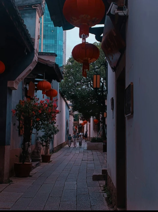 a city street filled with lots of lanterns
