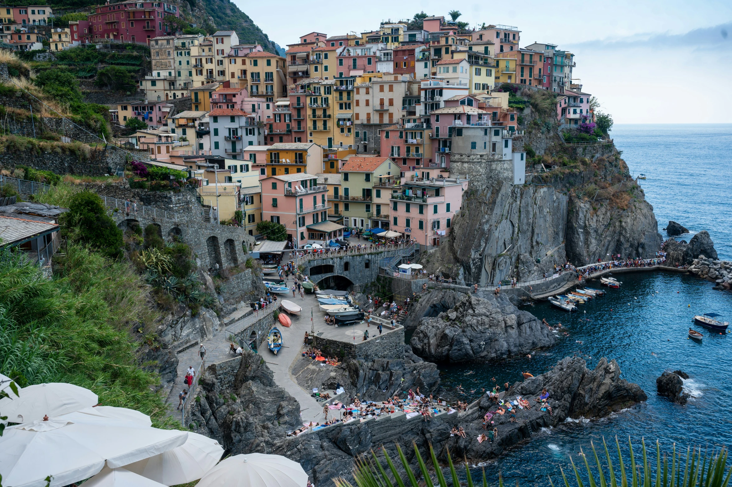 the small village is perched up on the edge of a cliff