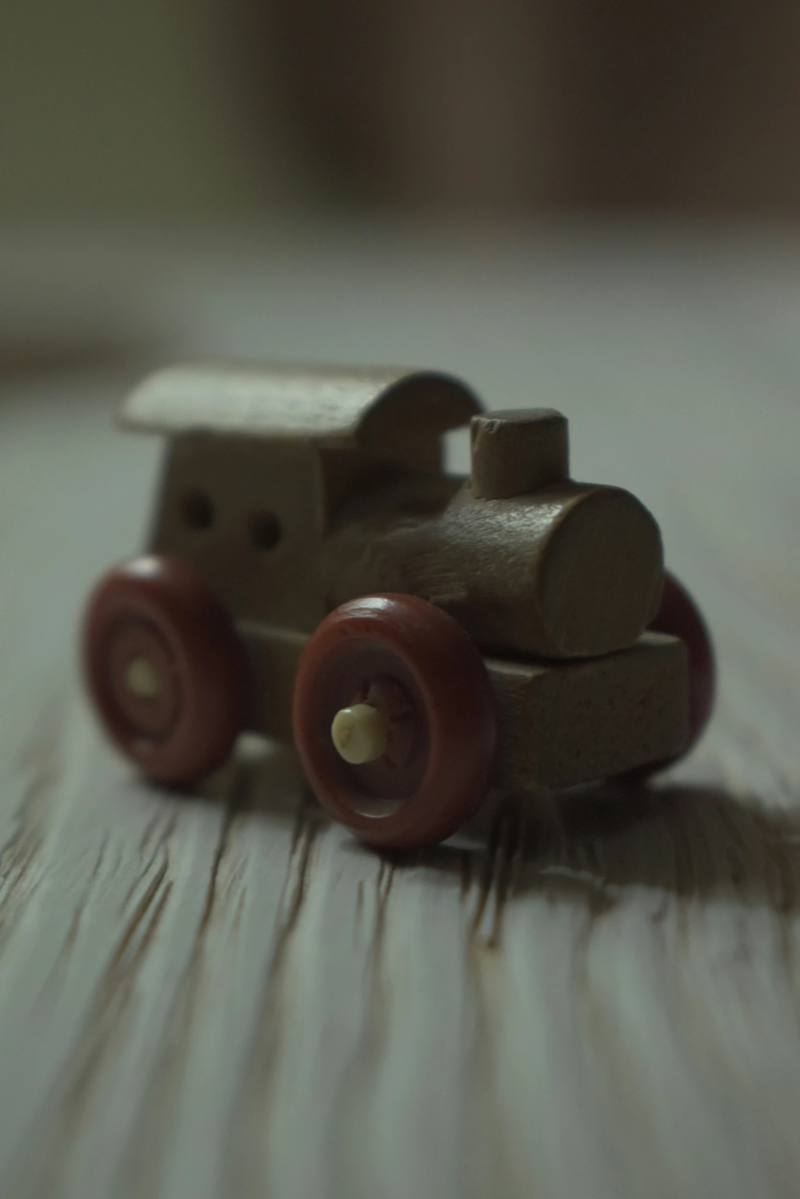 the toy car has wheels and is in very good condition
