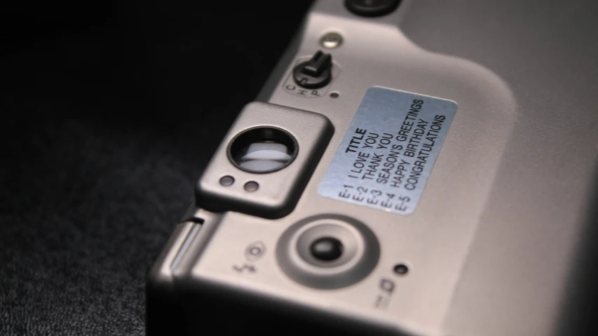 a camera with a small card attached to the side