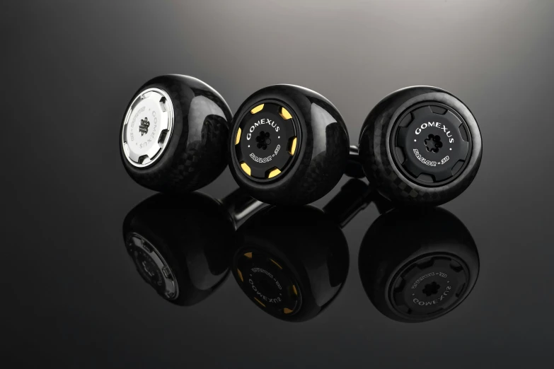 three different types of wheels on a black background