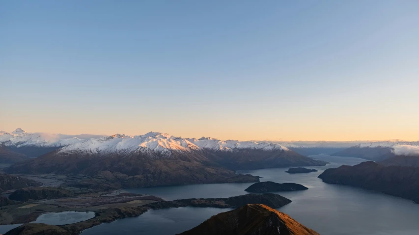 looking out over a bay and mountains, with mountains in the distance