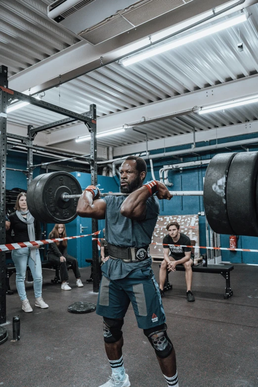 several people engaged in crossfit and conditioning