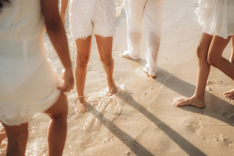 a group of people standing next to each other