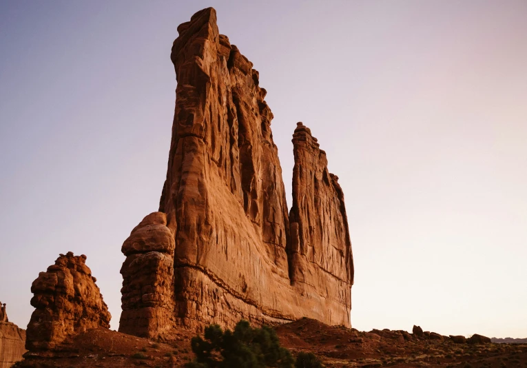 a mountain range with some big rocks and some plants