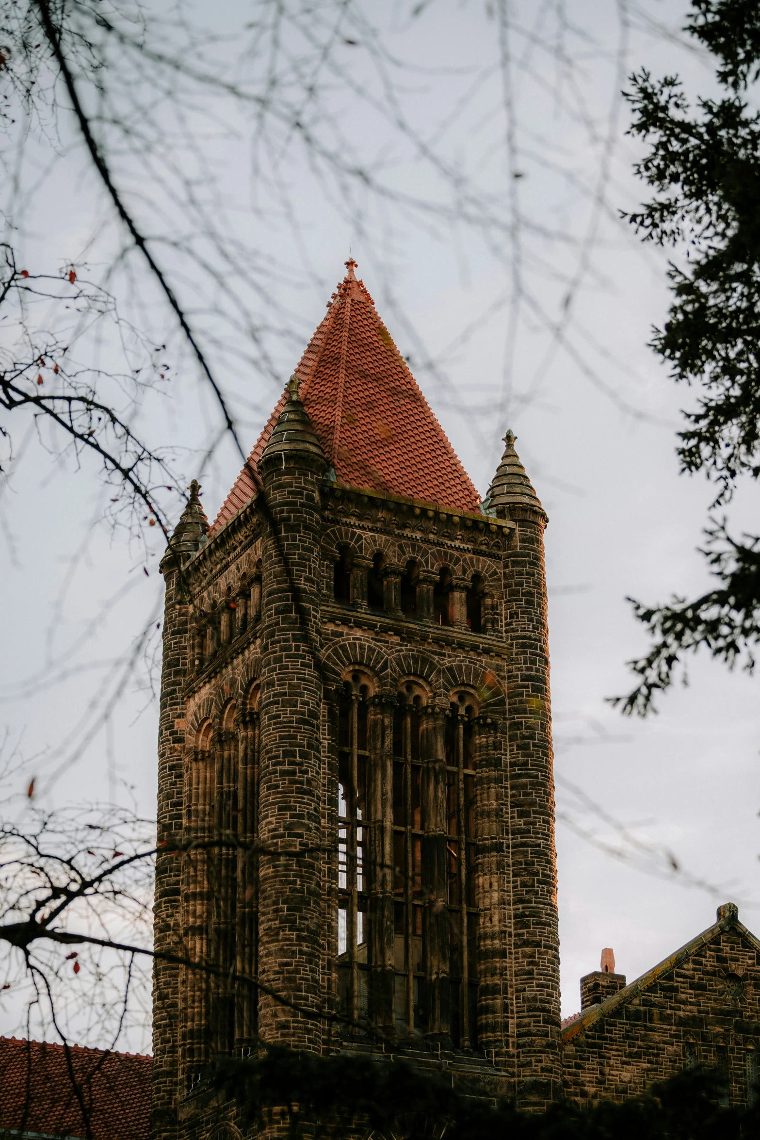 a clock tower at the end of a church