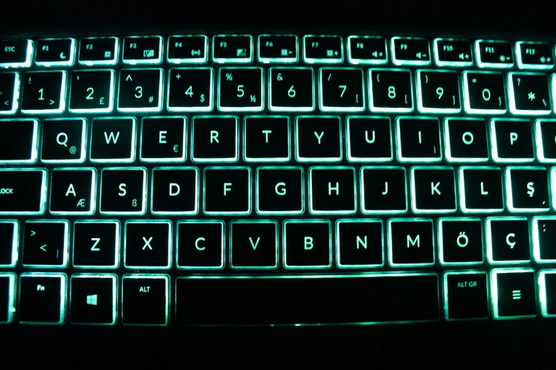 glowing keyboard with illuminated upper part and lower part