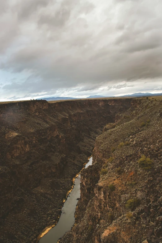 the view from an overlook looking down at a river and canyon