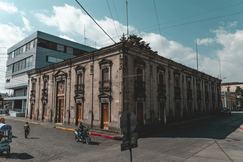 an old building that has a scaffold attached to it