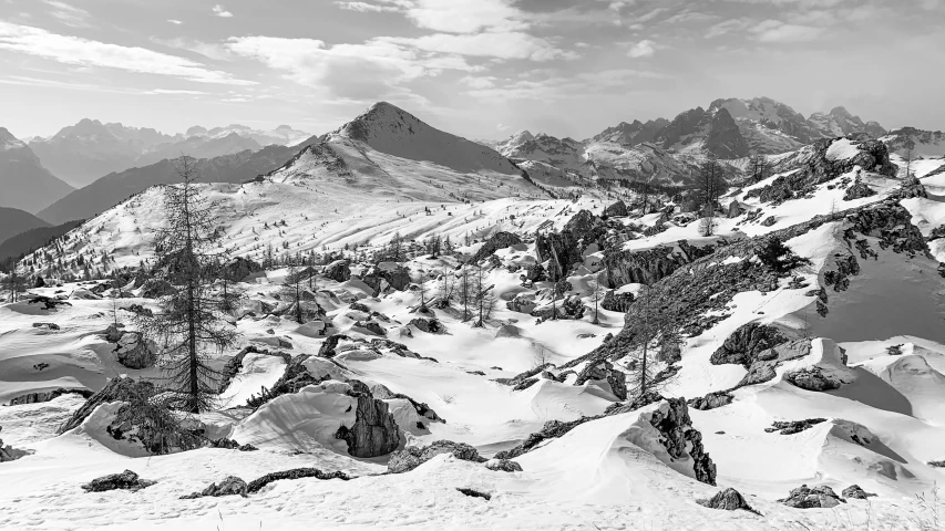 this black and white po shows an area with snow covered mountains