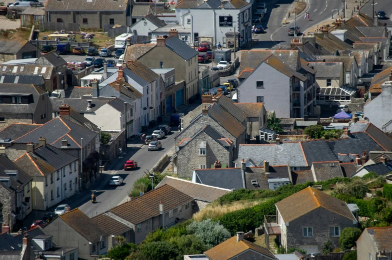 the aerial view shows small houses along the river