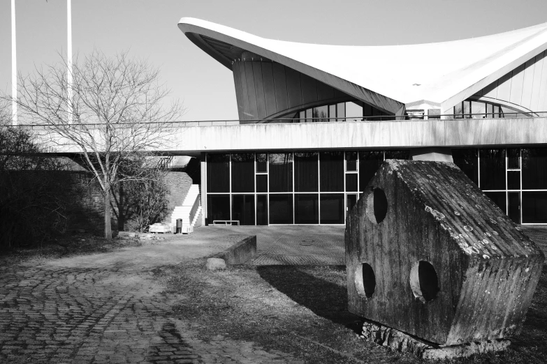 a black and white po of a building in a courtyard