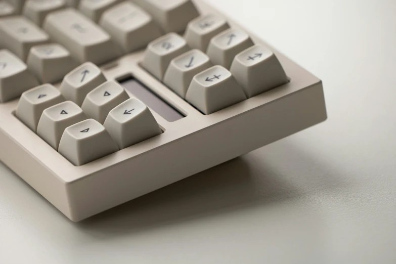 a computer keyboard with it's key board and a smaller key board