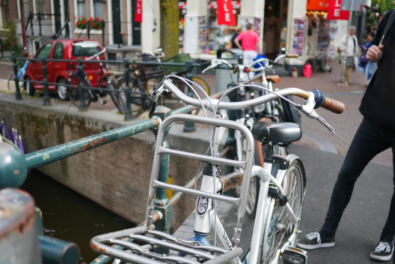 a group of bikes is parked next to each other