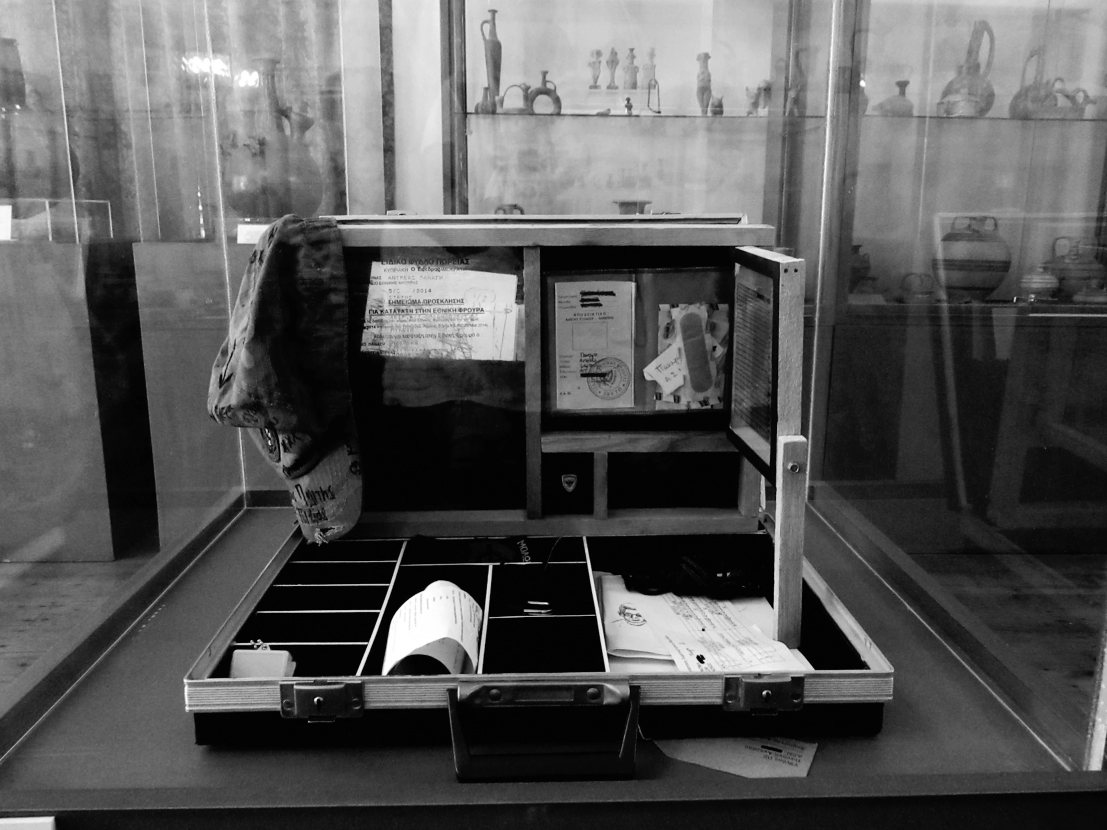 an opened case with papers and papers inside