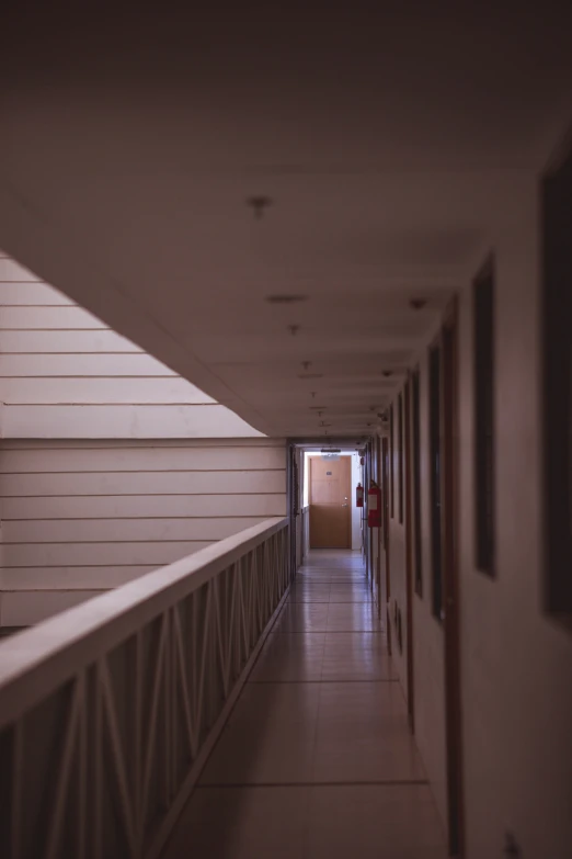 a hallway leading to another room and a door