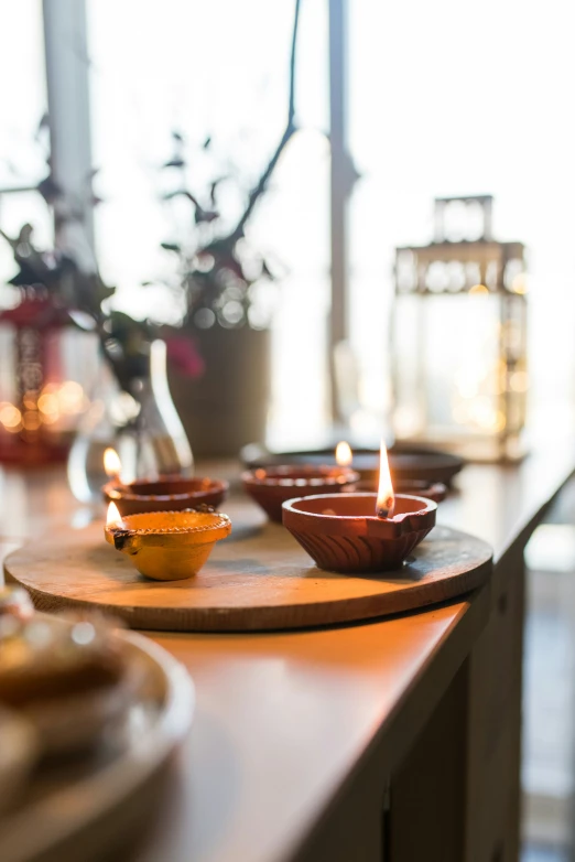 there are several empty bowls sitting on this table