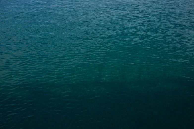 a blue body of water surrounded by land