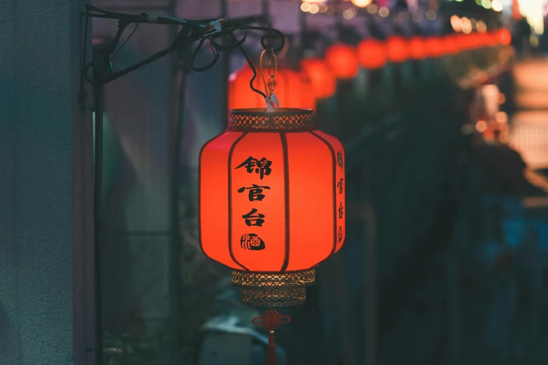 a chinese lantern is hung on a street