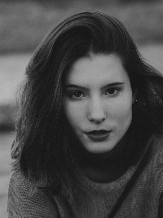 black and white pograph of a woman with long hair