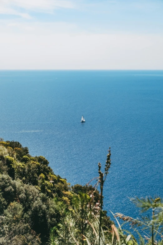 a boat that is in the water out on the ocean