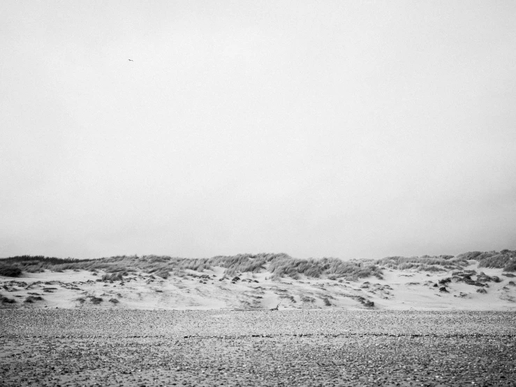 a beach is covered in white sand and water