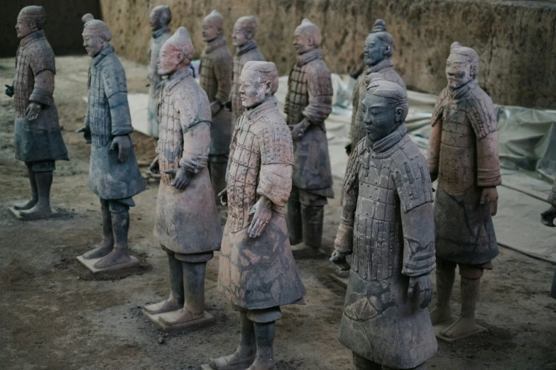 a group of large sculptures with various figures standing