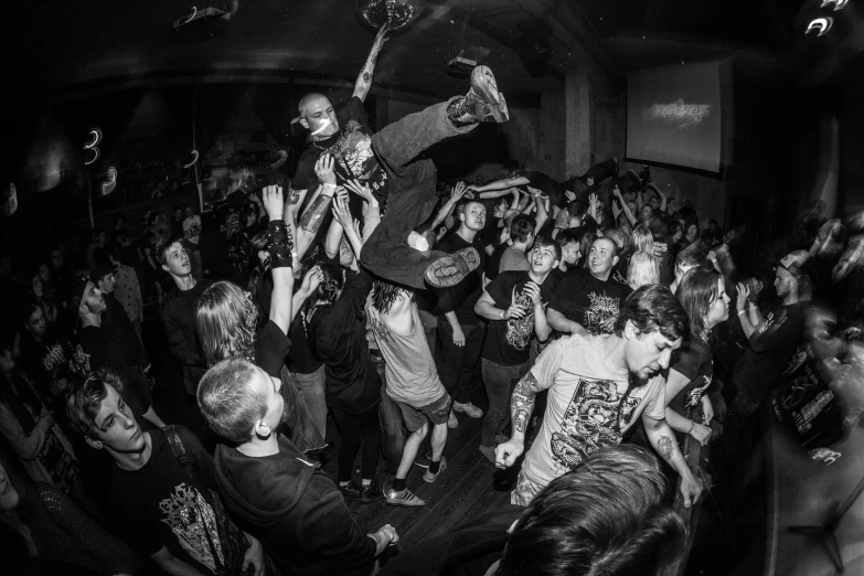 a group of people at a party in a room