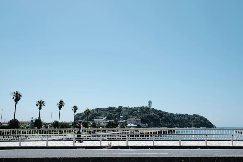 there is a bench along the water side