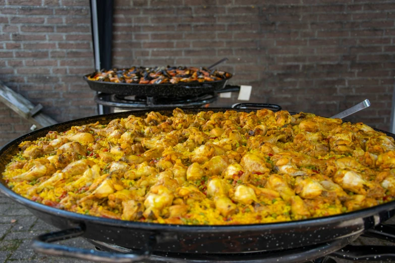 many food items are spread out on a grill