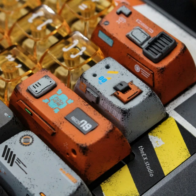 orange and grey electronic items with different colors on them
