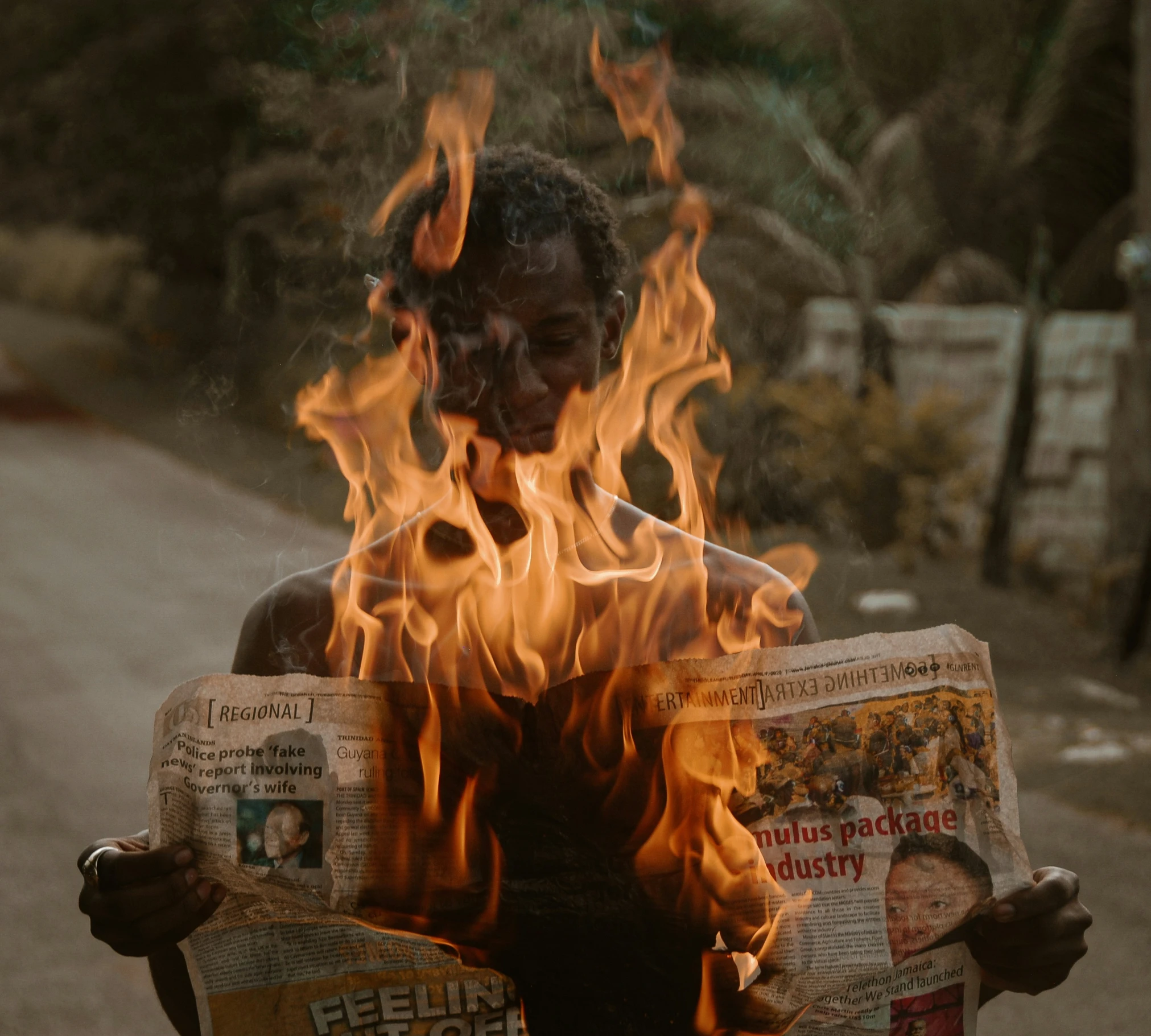 a woman holding a newspaper in her hands