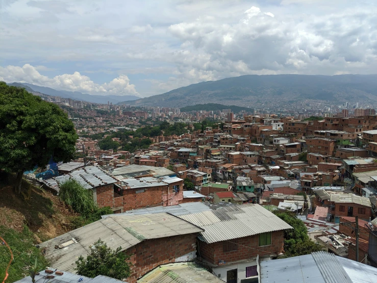 a large city is in the distance with small buildings on the sides