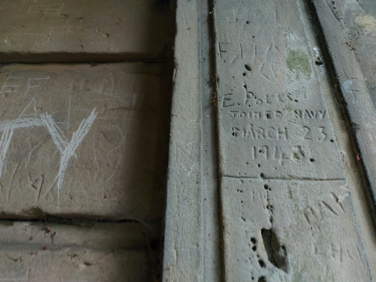 cement steps are covered with graffiti and writing