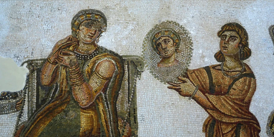 two men and one woman are depicted in this mosaic