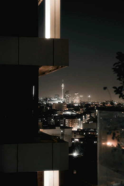 night time view of a city at the top of a building