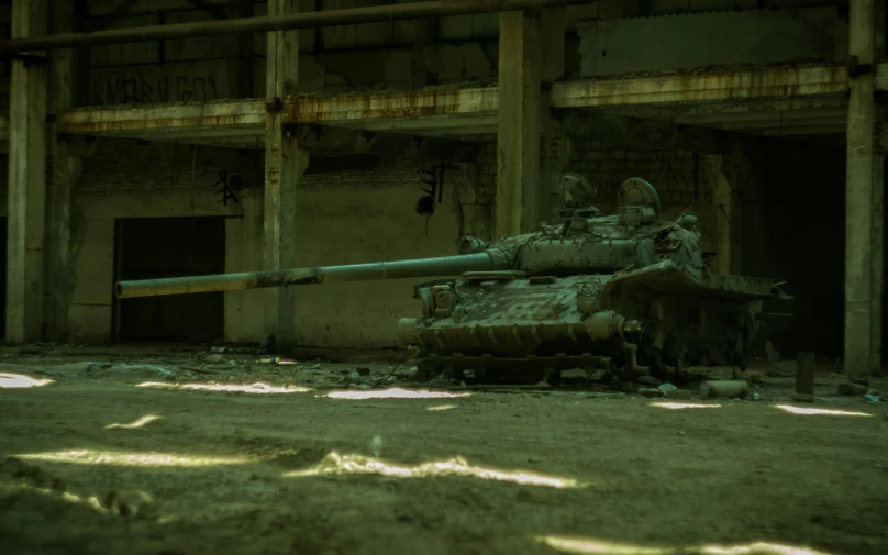 an abandoned tank is parked outside an old building