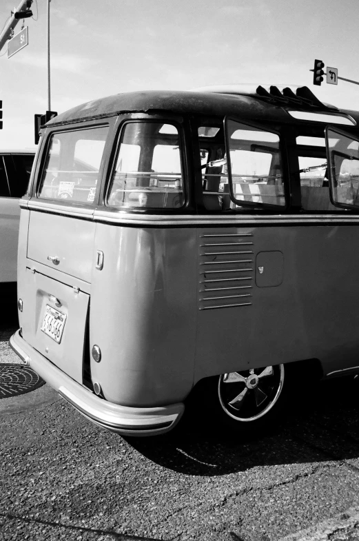 a black and white po of a bus with no wheels