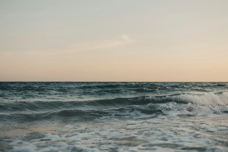 a body of water surrounded by waves