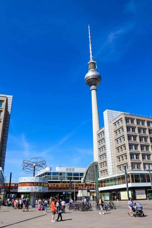 the building is very tall and has a large clock