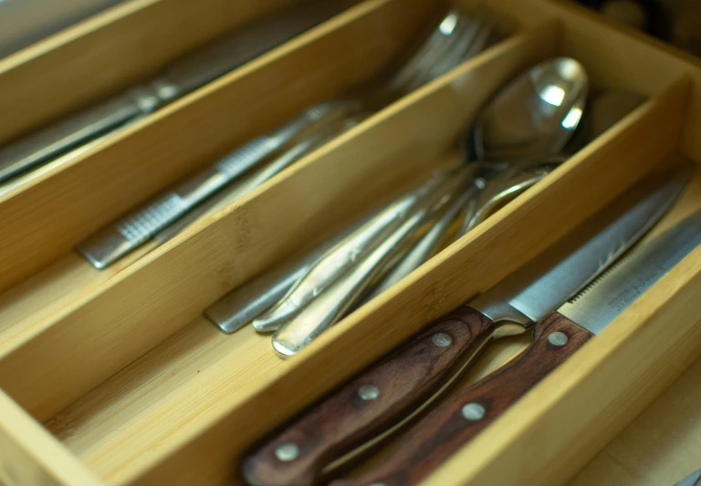 a knife tray holds silverware and other knives