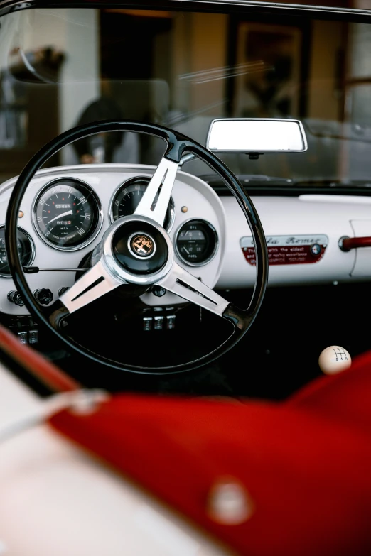 a white car steering with the dashboard and dash board