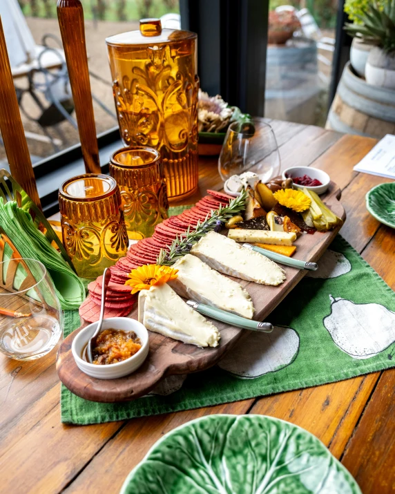 a tray of food sitting on top of a wooden table