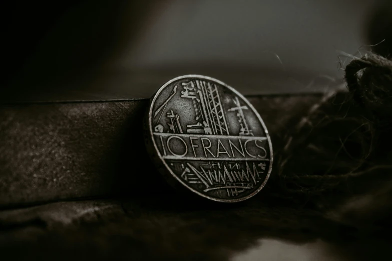 a coin laying on top of a pile of hair