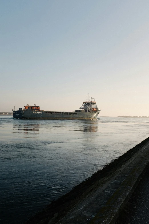 a large barge traveling across a large body of water