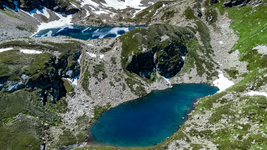 a large body of water in a mountainous area