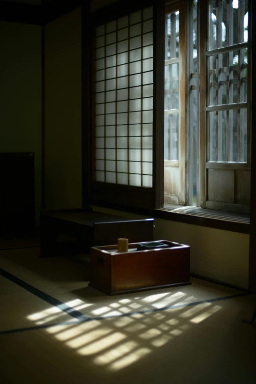 a room with sun streaming through a window